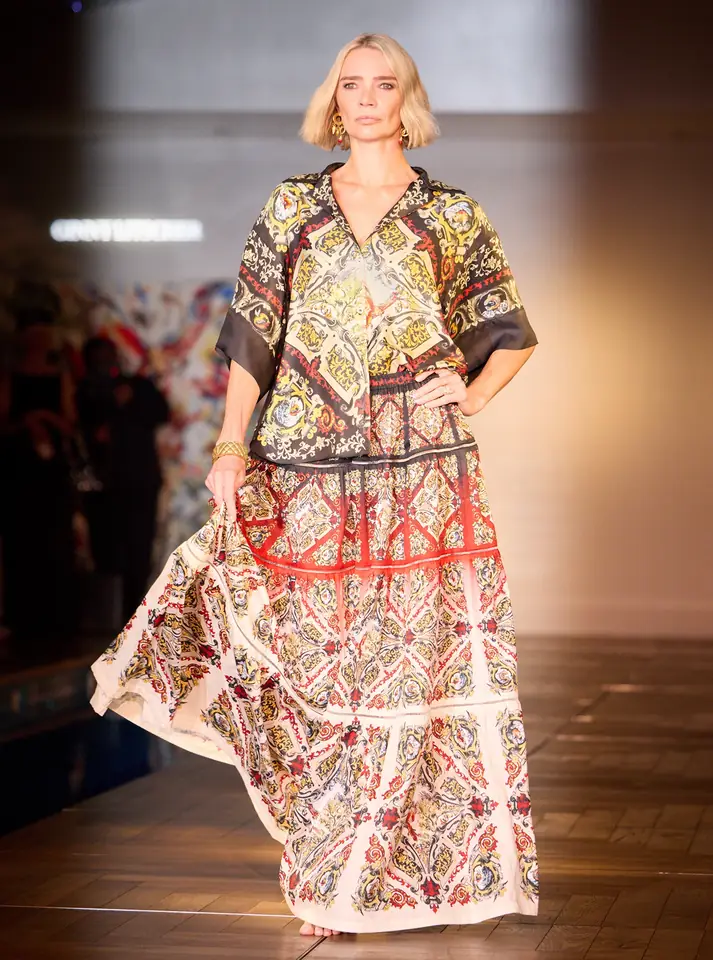 A Ginny Litscher hand-painted silk piece on the runway