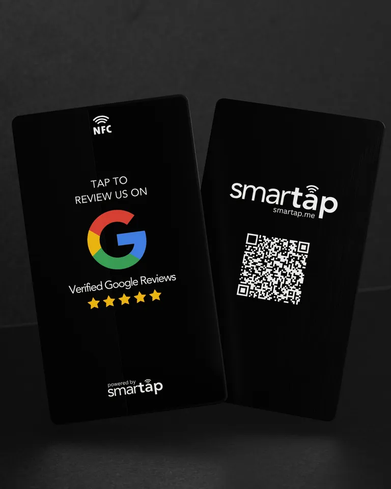 Two black metal NFC review cards, one printed "Tap to review us on Google", the other with a QR code