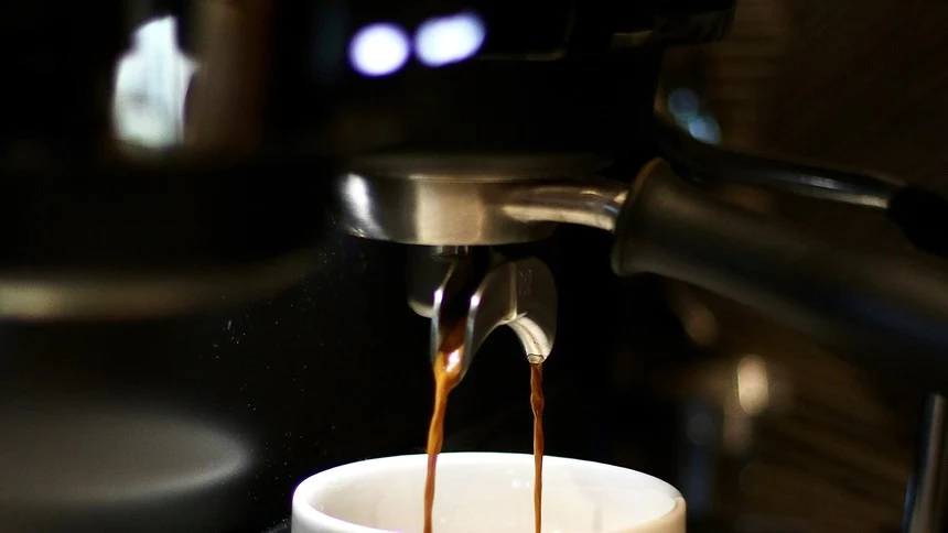 Espresso pouring into a cup at The Artisan, a coffee shop in Locksbottom, Orpington