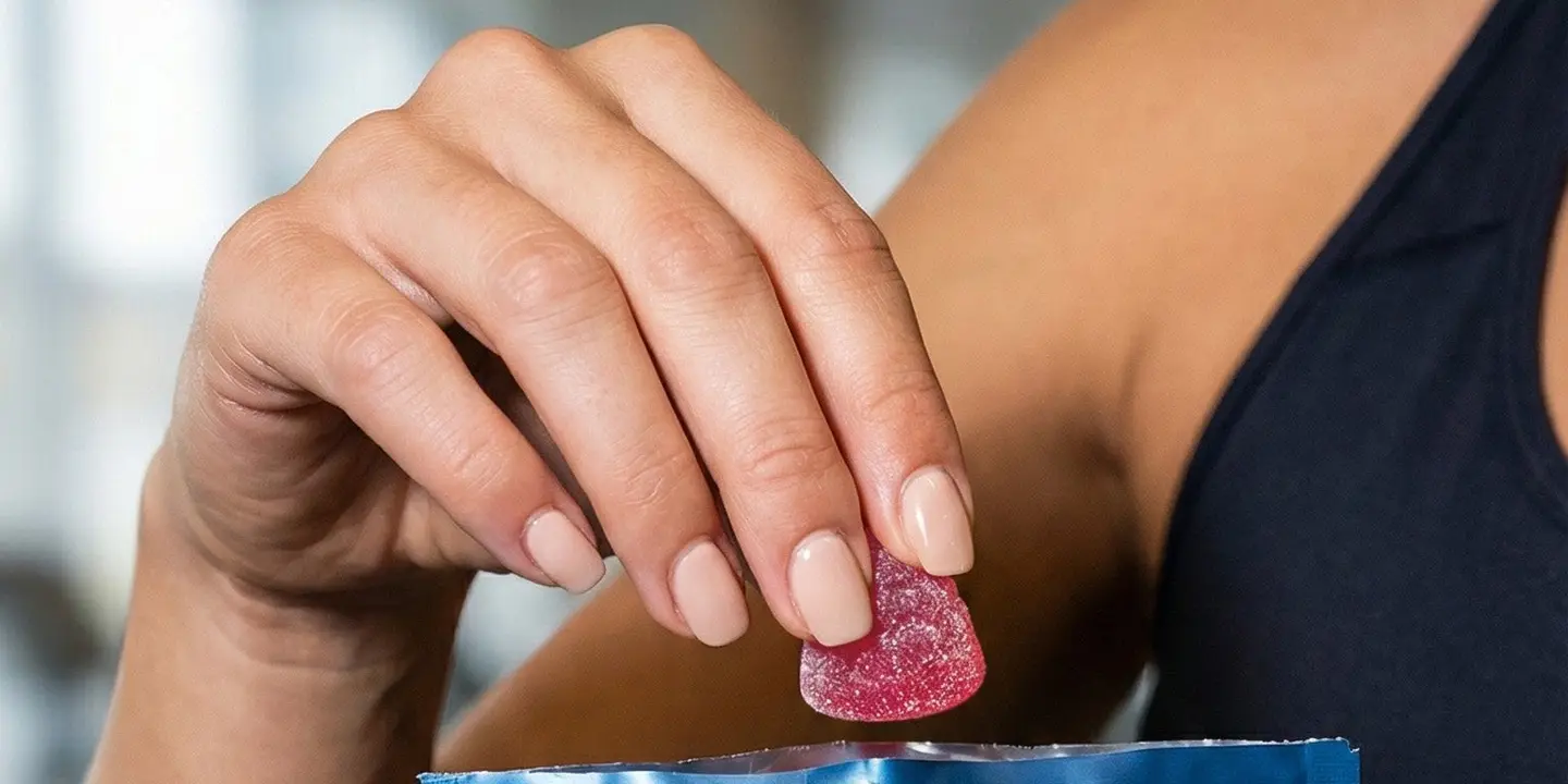 A Fittr creatine gummy, held in the hand
