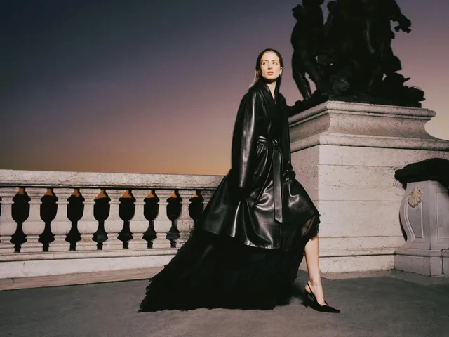A Nour Hammour leather coat, photographed on a Paris balustrade