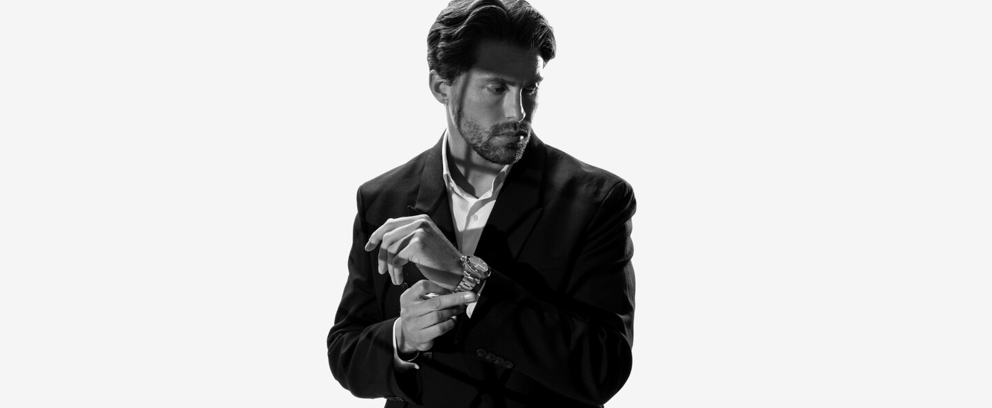 A model checking a Waldo Swiss watch, one of the Shopify stores we build and run